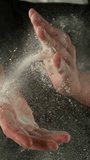 Super Slow Motion Chef Clapping Hands with Flour . Filmed on High Speed Cinema Camera, 1000 fps . Closeup of Bread or Pizza Dough Preparation - Powered by Shutterstock - Get 15% off with code: PIKWIZARD15