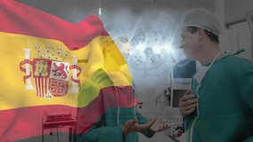 In operating room, surgeons discussing with Spanish flag animation overlaying them. Surgery, teamwork, healthcare, medicine, collaboration, discussion - Powered by Shutterstock - Get 15% off with code: PIKWIZARD15