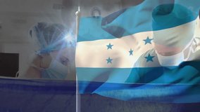 Waving Honduran flag, healthcare workers wearing protective gear standing together. solidarity, protection, teamwork, pandemic, frontline, safety - Powered by Shutterstock - Get 15% off with code: PIKWIZARD15