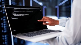 Cloud Computer Engineer Coding In Server Room In Data Center. Configuring AI Technology - Powered by Shutterstock - Get 15% off with code: PIKWIZARD15