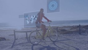Cyclist on beach path with digital data processing animation overlay. Cycling, fitness, technology, outdoor, exercise - Powered by Shutterstock - Get 15% off with code: PIKWIZARD15