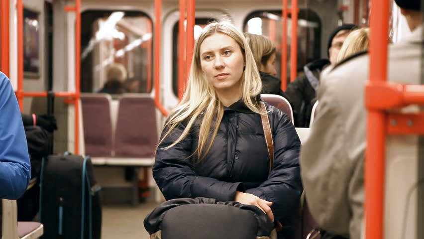 Beautiful young woman in subway 
