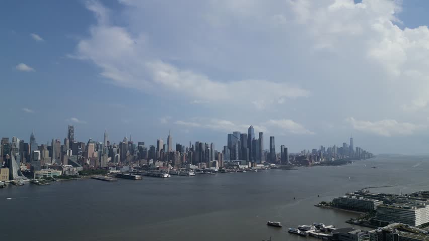 aerial view of new york city skyline (midtown and downtown) from across the hudson river in west jersey (weehawken ferry skyscraper tall building towers) scenic travel tourism destination 