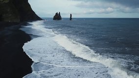 Black Sand Beach with Reynisdrangar Rocks in Iceland - Powered by Shutterstock - Get 15% off with code: PIKWIZARD15