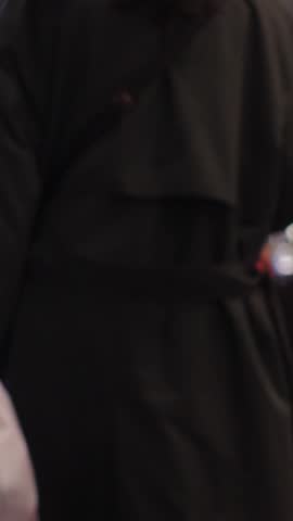 SHINJUKU, TOKYO, JAPAN - NOV 2023 : KABUKICHO downtown area at night. Colorful led neon street signs at entertainment district. Japanese urban city nightlife, bar and drinking concept vertical video.