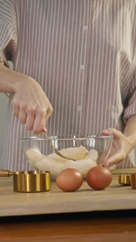 Pastry chef employs a fork to transform the raw banana into a smooth banana puree, which is then used to make delectable sweet pastries.