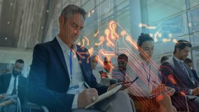 In meeting, business professionals discussing technology integration with digital circuit animation. Teamwork, innovation, collaboration, brainstorming, digital transformation, business strategy - Powered by Shutterstock - Get 15% off with code: PIKWIZARD15