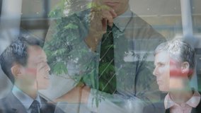 Discussing global network connections, business professionals collaborating in office setting. Networking, collaboration, teamwork, corporate, meeting, communication - Powered by Shutterstock - Get 15% off with code: PIKWIZARD15