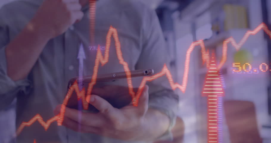Using tablet with financial data and stock market graph, business person analyzing. Finance, analysis, stocks, analysis, investment, economy