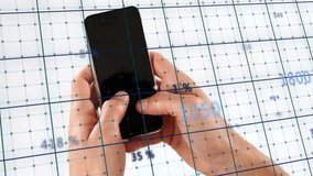 Using smartphone with social media icons and data grid overlay, hands interacting. Technology, digital, touchscreen, connection, mobile, innovation - Powered by Shutterstock - Get 15% off with code: PIKWIZARD15