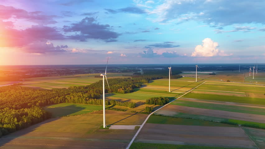 Explore the vast landscape of wind turbines harnessing renewable energy for electricity production
