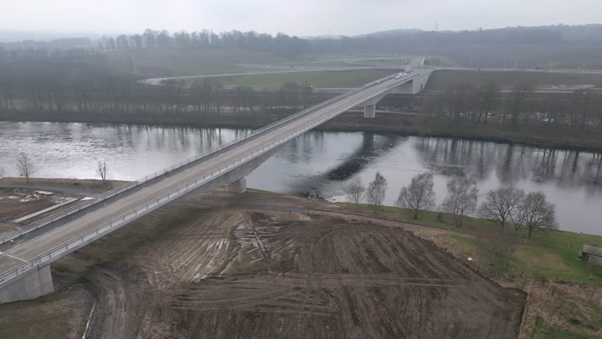 Aerial footage showcasing the construction site around the new Destiny Bridge across River Tay, Perth.
