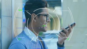 Using smartphone, man interacting with digital animation overlay of future tech elements. Technology, innovation, futuristic, augmented reality, interactive, virtual - Powered by Shutterstock - Get 15% off with code: PIKWIZARD15