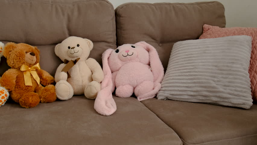 soft toys on the sofa. Selective focus.