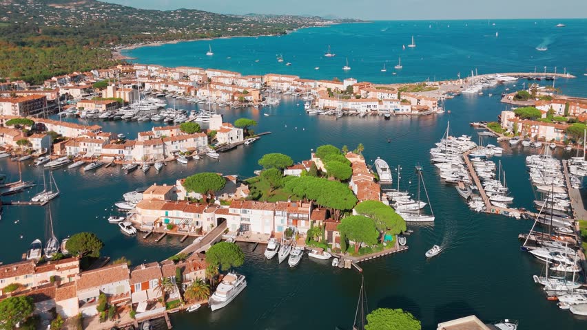 Aerial view of the Port Grimaud, Provence Alpes Cote d'Azur region in southeastern France. Beautiful marina in the French riviera. Colorful houses And boats in Port Grimaud