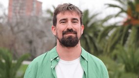 A happy man with a delightful smile showcasing his joyful demeanor while engaging in a friendly interaction that exudes warmth and positivity, capturing the essence of uplifting moments in life. High - Powered by Shutterstock - Get 15% off with code: PIKWIZARD15