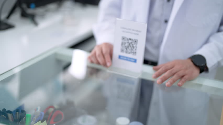 Medical pharmacy clinic, pharmaceutical, pharmacist and contactless payment technology. Asian woman customer buy medicine with using smartphone scan QR code making online banking payment at drugstore.