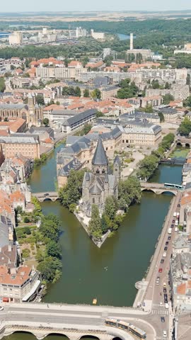 Vertical video. Metz, France. New Temple - Protestant Church. Moselle River. View of the historical city center. Summer, Sunny day, Aerial View, Point of interest