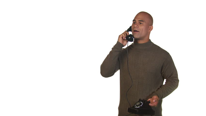 Mid shot of a man using a retro phone. Recorded on white background.