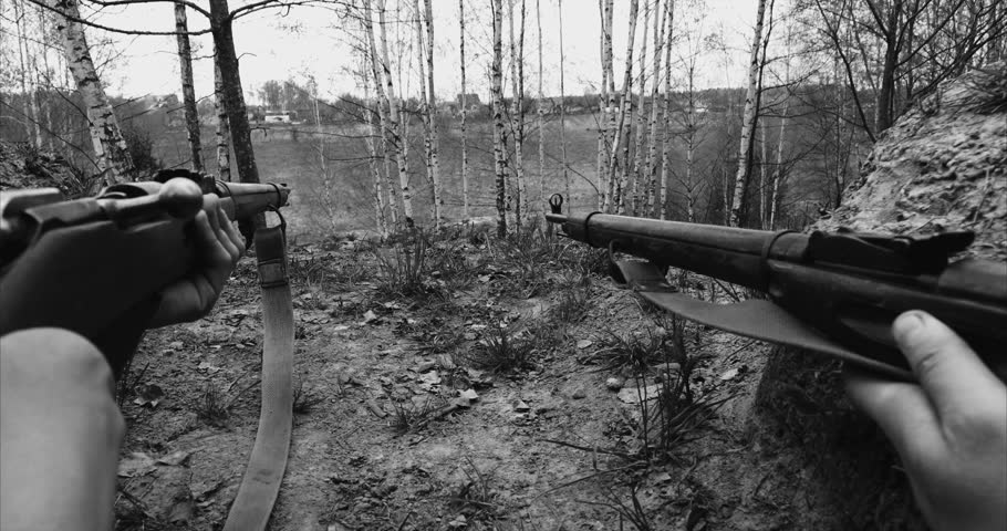 Historical Re-enactment Black And White Video. Re-enactors Dressed As Soviet Russian Soldier Aiming With Rifles. Soviet Russian Soldiers Uniform. Soldiers Shoots With Rifle.