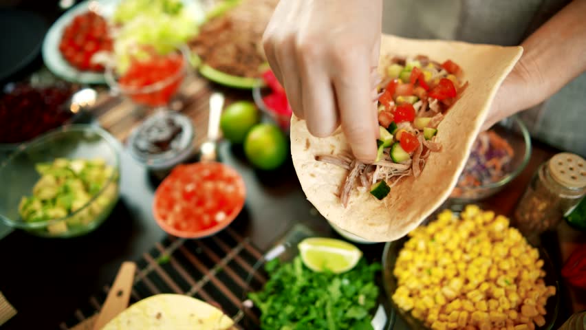 Tasty Mexican Tacos Filled Meat. Homemade American Soft Shell Beef Tacos. Mexican Food Burrito. Tortilla Fast Food. Mexican Pork Carnitas Tacos Fajitas. American Taco Salsa Corn Tortilla Carne Asada
