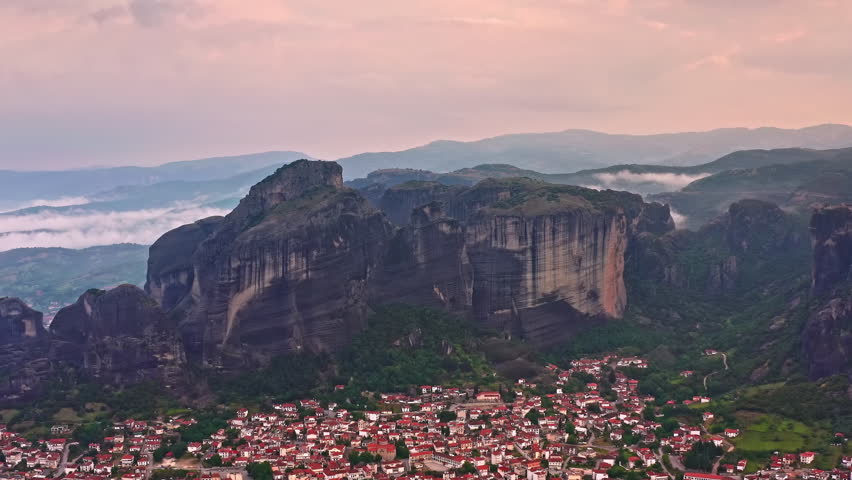 Meteora aerial landscape. Kalambaka town and mountain cliffs