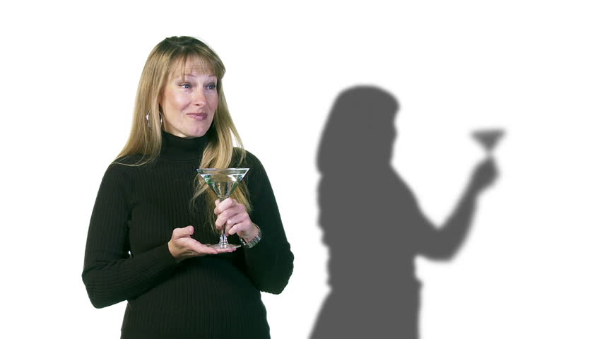 Blonde woman drinks a martini while her shadow gets increasingly tipsy.
