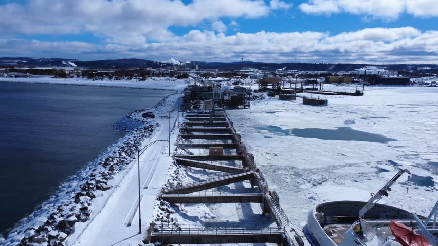 
Aerial view of Port of Matane for commercial vessels, fishing vessels, government vessels, road and rail ferrys including a shipyard.Quebec,Canada.