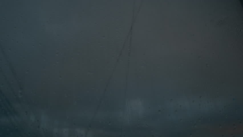 Drops of rain on glass. sad weather.the wire sways in the wind, wet seasons