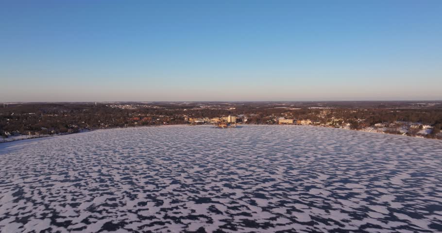 Amazing Hyperlapse Above Lake Geneva, Wisconsin at Sunset. Cold Winter Day