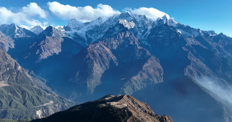 Aerial footage of snow capped mountains landscape in tibet, China