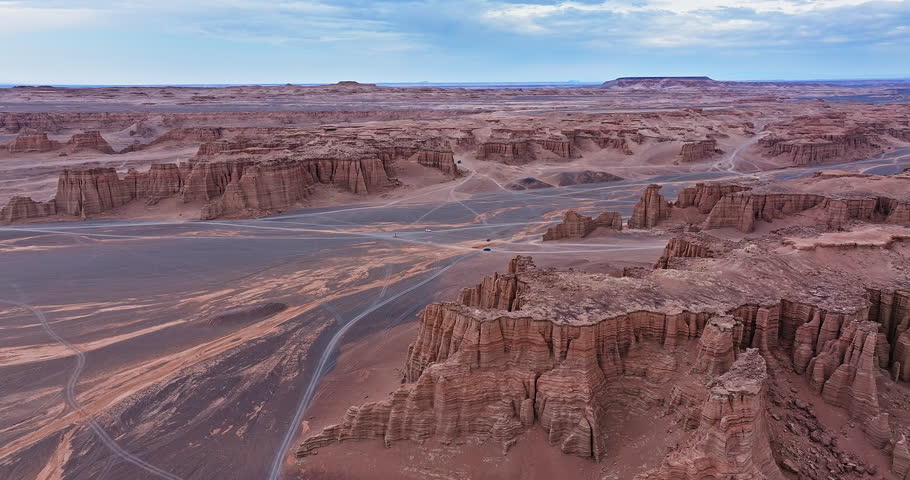 Vast landscape of yadan landform with eroded rock formations. Famous Dahaidao no man's land natural landscape in Xinjiang, China.