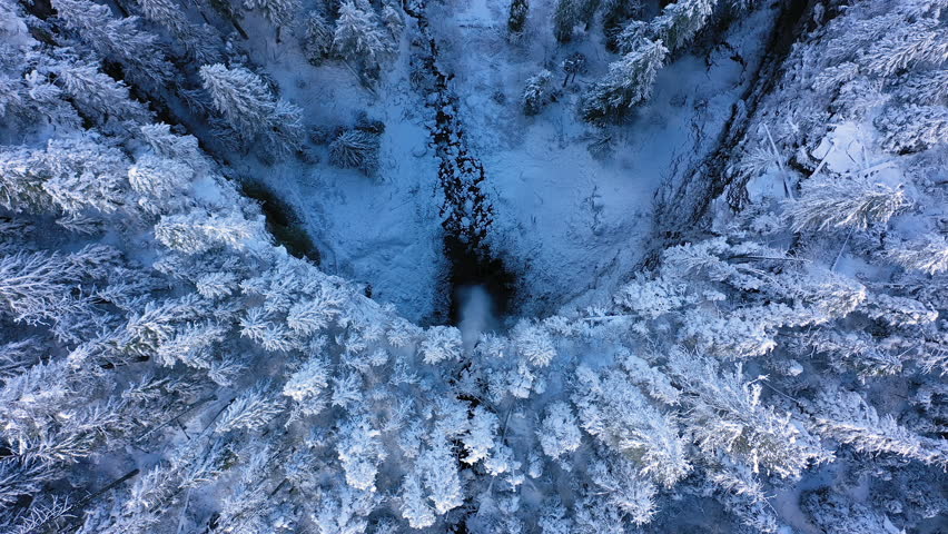 Beautiful Oregon Waterfall in Winter, drone top down descending