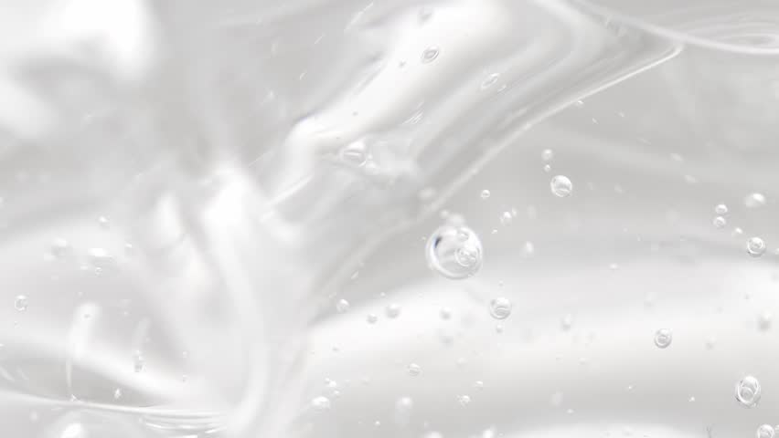 Thick skin serum, aloe vera gel close-up. Texture of cosmetic liquid product.