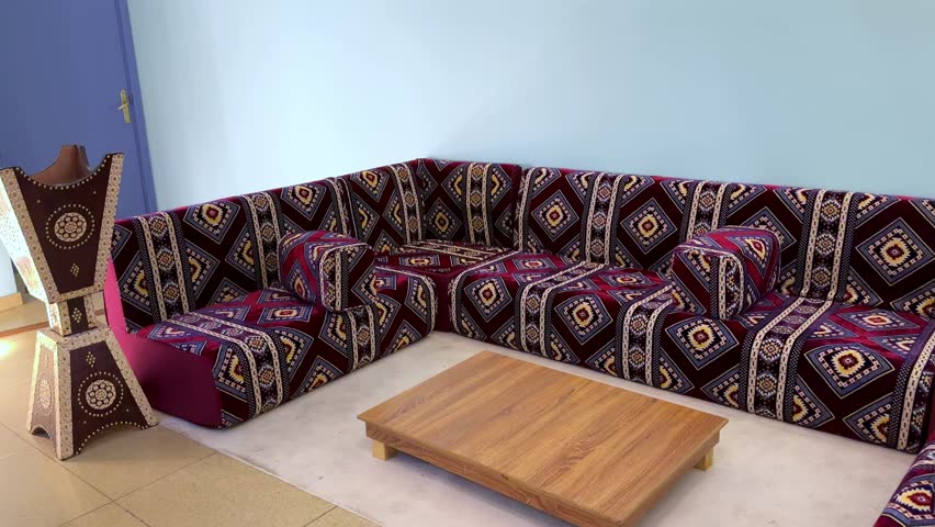 Immerse yourself in the vibrant elegance of this traditional khaliji Majlis. Experience the intricate designs and rich colors in stunning 4K resolution.