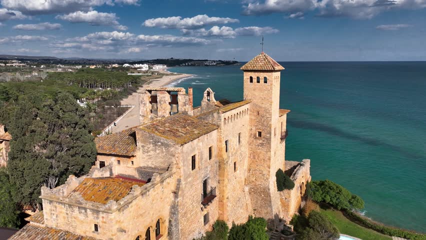 Aerial view of Tamarit Castle on Costa Daurada in Spain, near Tarragona, Costa Dorada, Catalonia. Historic Tamarit castle on Costa Dorada Meditarrenian coast, Spain 