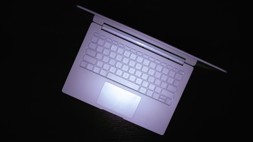 Streamlined Workday: Woman Operating Laptop, Opening, Closing, and Typing