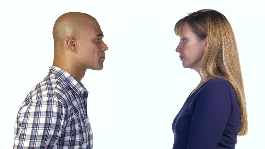 Man and woman shake their heads and show disagreement with each other. Profile