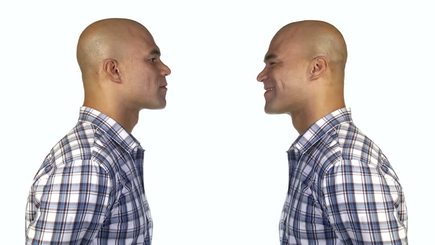 Man nods his head and shows he agrees with what's being said or presented to him