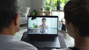 Senior couple have video call with doctor use wireless internet connection on laptop, Senior patient talk consult with physician online on webcam conference on computer - Powered by Shutterstock - Get 15% off with code: PIKWIZARD15