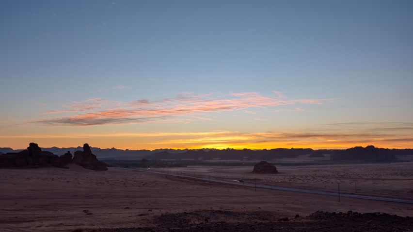 Time lapse of sunset sunrise in rock formation desert in Alula, Saudi Arabia.