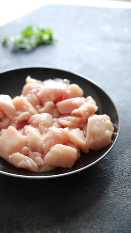 Chicken raw meat pieces of meat poultry tasty fresh delicious gourmet food background on table rustic food top view copy space keto and paleo diet