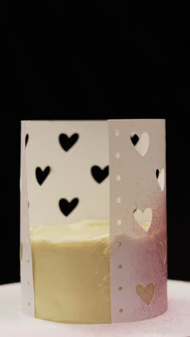 decorating cake using heart stencil spray