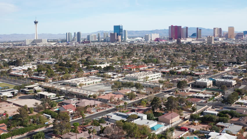 Aerial drone view of Las Vegas city skyline with residential homes and trees 05 - Aerial Drone View