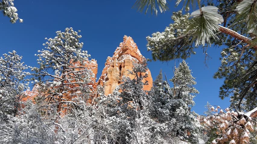 Red rock formations covered in snow in Bryce Canyon National Park, Utah, United States