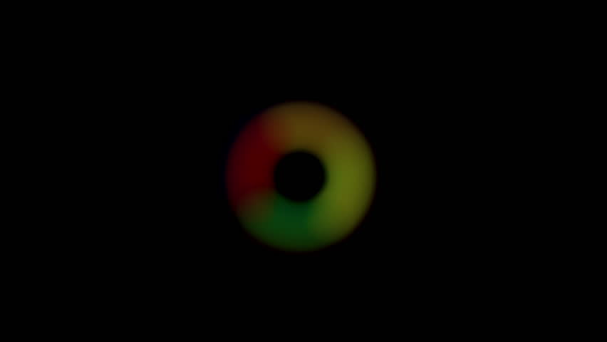 Blurred Circular Loading Animation in Rainbow Colors, showcasing a soft, diffused effect with red, green, and yellow tones indicating the progress.