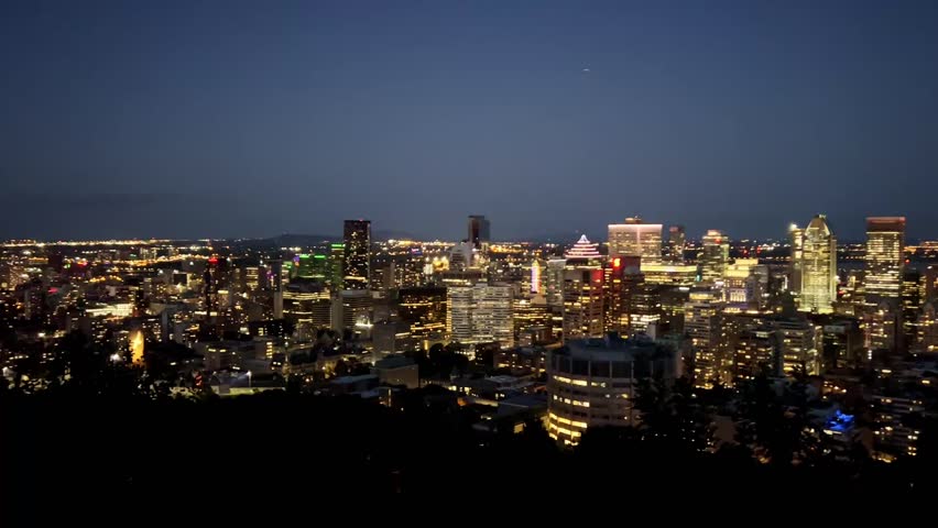night view of montreal, quebec skyline captured in horizontal orientation
