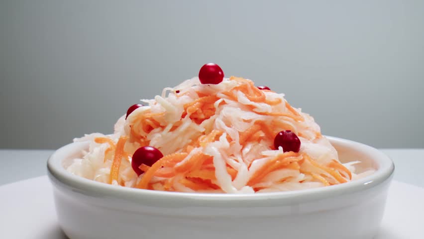 Sauerkraut fermented cabbage variety preserving jars. Homemade Sauerkraut with Carrot and Salad Cabbage with Beetroot on a wooden table. Fermented food. 