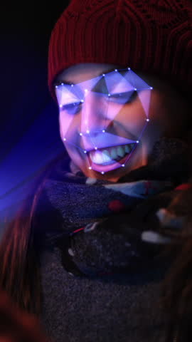 Smartphone using facial recognition system to unlock. A woman face is being scanned as a security measure. Face detection points. Perfect to illustrate: security system, futuristic technology.