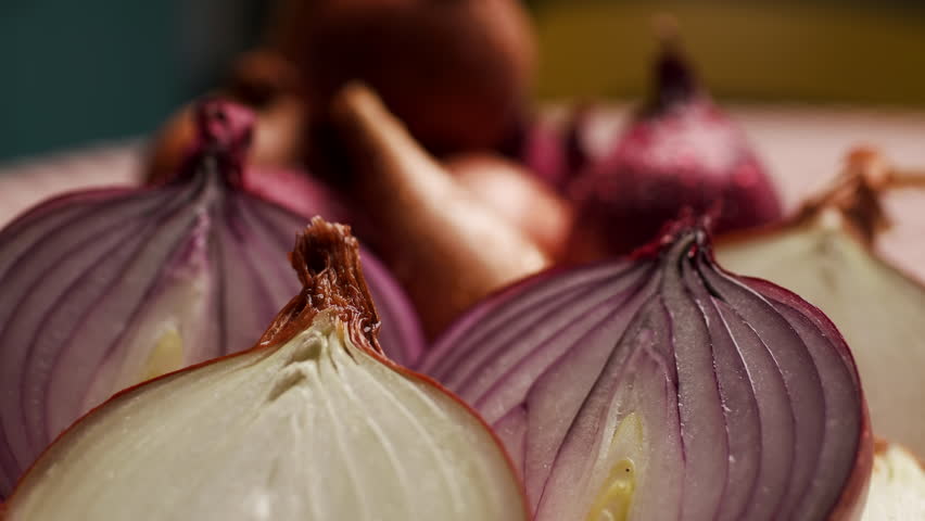 Close Up of Onion Halves on Wooden Board, Handheld Camera